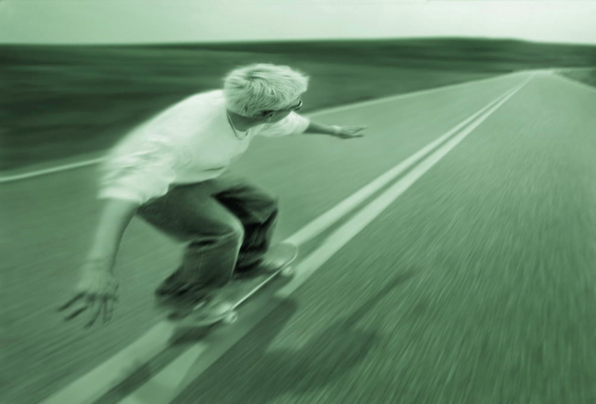 Teenager Skateboarding Down Road Canvas Art - Don Hammond Design Pics (17 x 11)