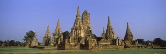 Temples in a field Wat Chaiwatthanaram Ayutthaya Historical Park Ayutthaya Thailand Canvas Art - Panoramic Images (36 x 12)