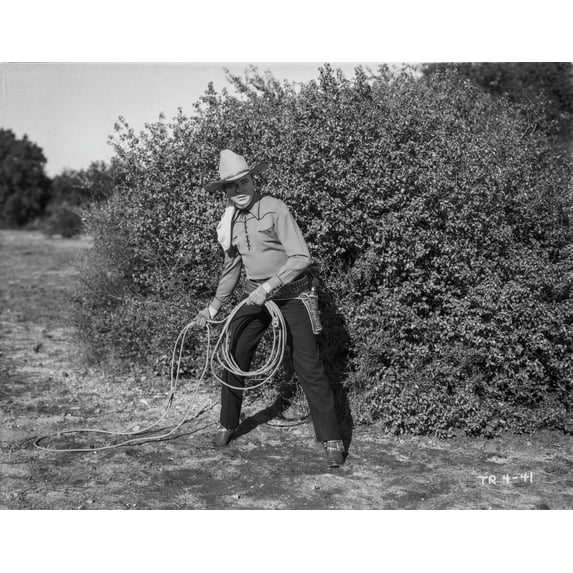 Tex Ritter with a lasso Photo Print (8 x 10)