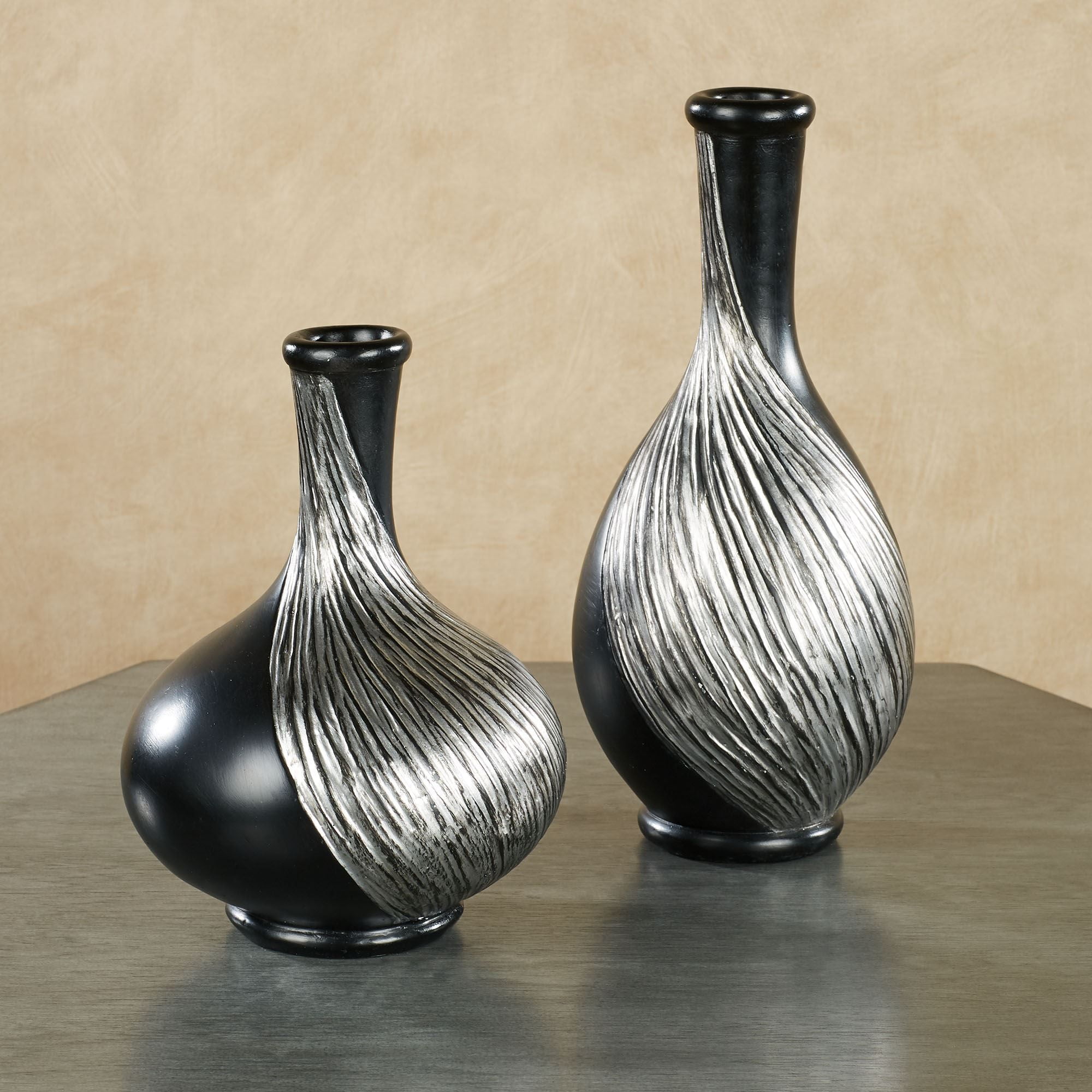 https://i5.walmartimages.com/seo/Textured-Swirl-Silver-Black-Decorative-Modern-Table-Vases-Set-of-2_51a704e3-c485-4152-aacc-331ad674d222.7aa8f9ce437529fa0c8fa7761844b659.jpeg