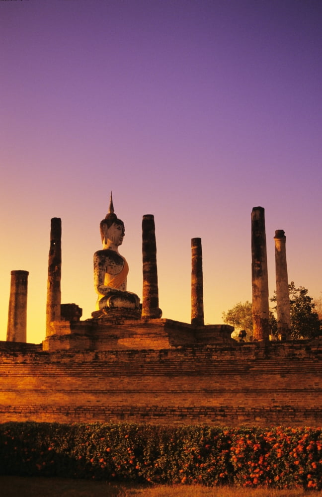 Thailand Sukhothai Glowing sunlight on structure of Buddha statue with many pillars at sunset Wat Mahathat Canvas Art - Richard Maschmeyer Design Pics (22 x 36)
