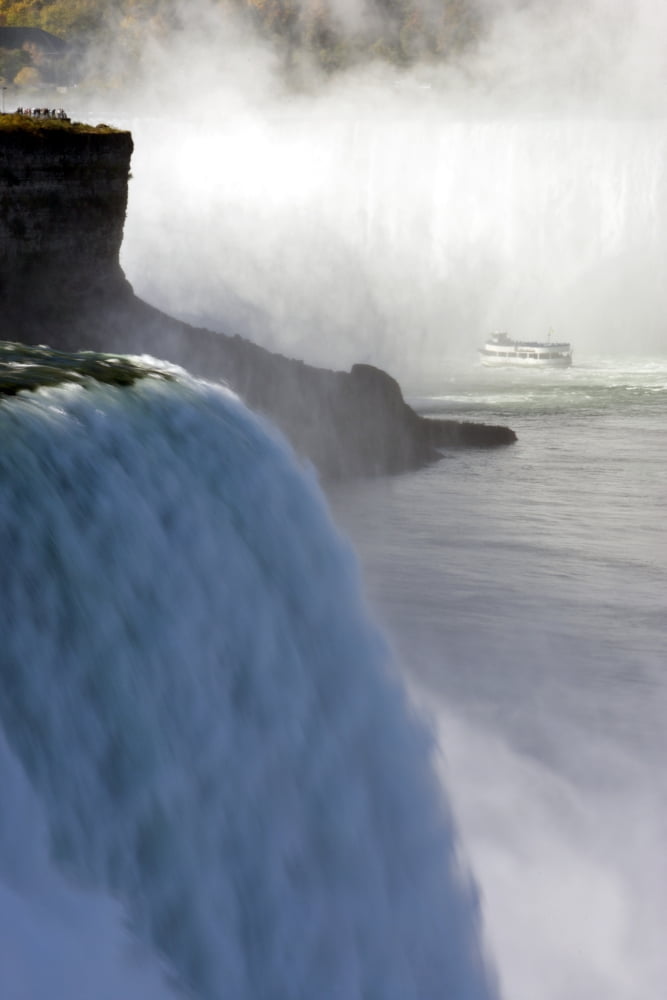The American And Horseshoe Falls Maid Of The Mist In The Background Niagara Falls New York Usa Canvas Art - Darwin Wiggett Design Pics (11 x 17)