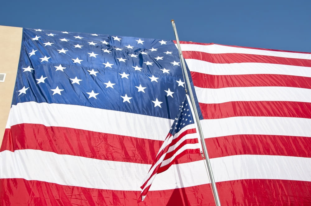 The American flag hangs over a headquarters building in Afghanistan Canvas Art - Stocktrek Images (35 x 23)