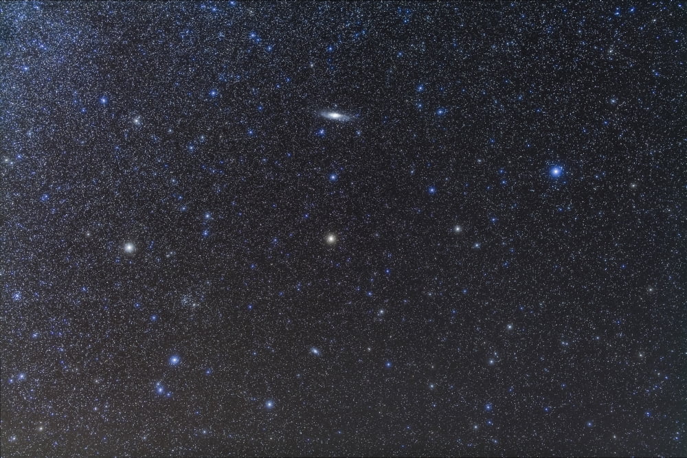 The Andromeda Galaxy and Triangulum Galaxy with star clusters Canvas Art - Alan DyerStocktrek Images (18 x 12)
