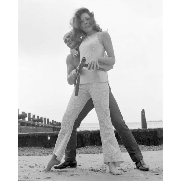 The Avengers TV Diana Rigg as Mrs Peel grapples with assailant holding gun 8x10