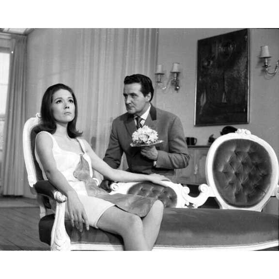 The Avengers TV Diana Rigg sits on sofa Patrick Macnee behind her 8x10 photo