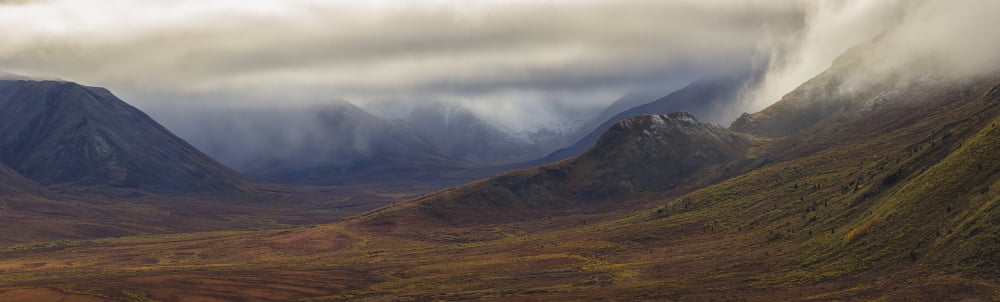 The Blackstone Valley along the Dempster Highway is shrouded in clouds in autumn Yukon Canada Canvas Art - Robert Postma Design Pics (39 x 11)