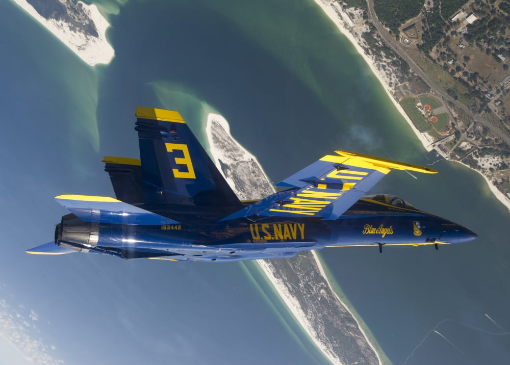 The Blue Angels perform a looping maneuver over Naval Air Station Pensacola Canvas Art - Stocktrek Images (34 x 24)