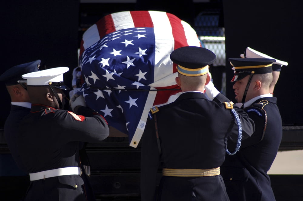The Ceremonial Honor Guard places a casket in the VC-25 aircraft Canvas Art - Stocktrek Images (34 x 23)