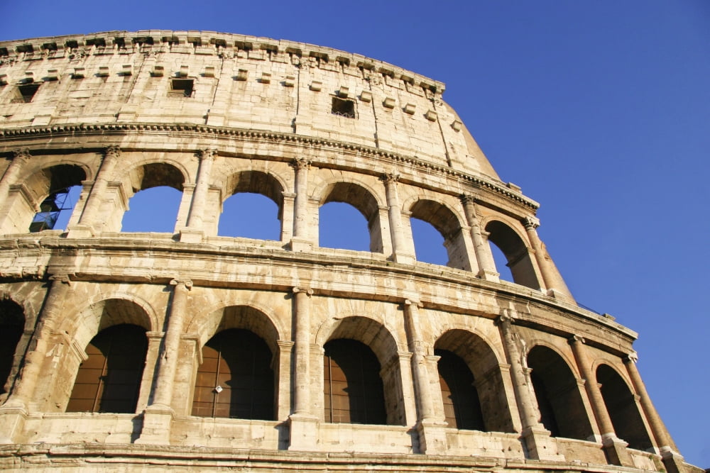 The Colosseum And Blue Sky Close Up Canvas Art - Mark Thomas Design Pics (19 x 12)
