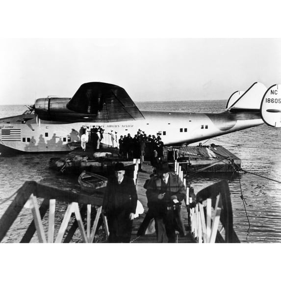 The First Passengers To Cross The Atlantic Leave Pan American'S Dixie Clipper Airplane In Lisbon History