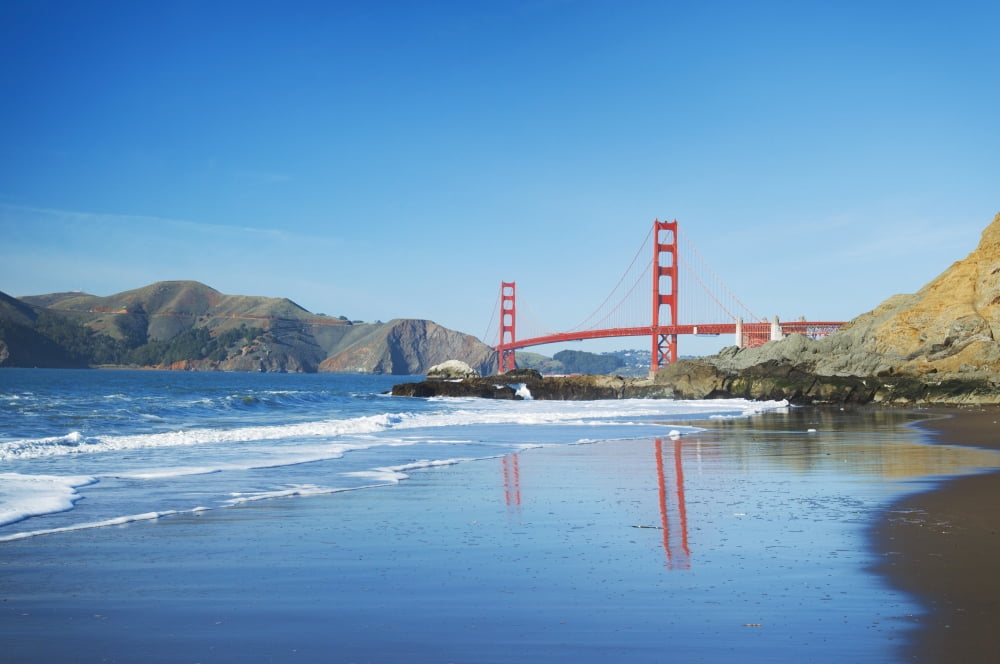 The Golden Gate Bridge in San Francisco with beautiful blue ocean in background Canvas Art - Design Pics Vibe Design Pics (34 x 22)
