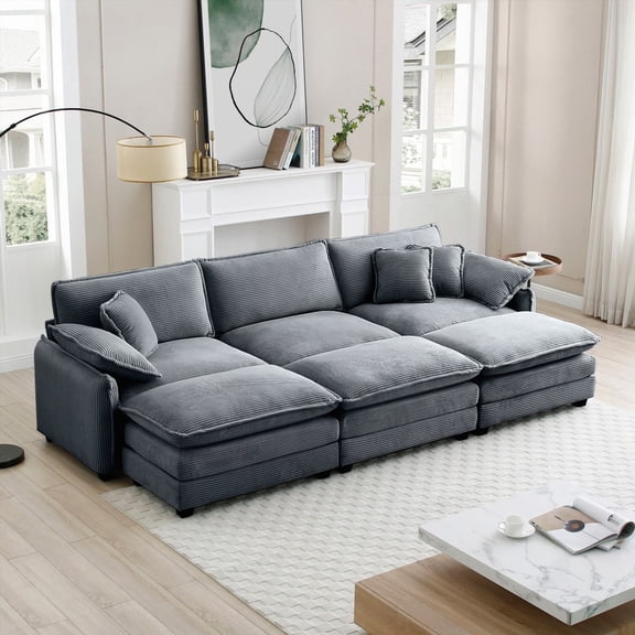 The Grey corduroy 3-seater sofa with 3 footstools. Epitome of style & retro. Unbeatable comfort!