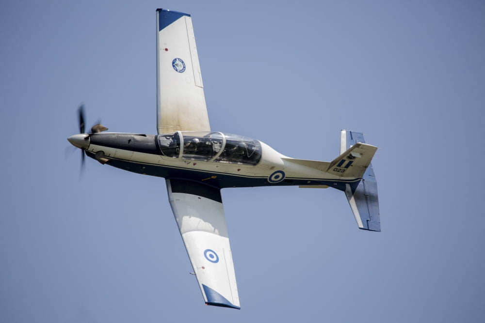 The Hellenic Air Force Daedalus demo team flies the T-6 Texan trainer Canvas Art - Timm ZiegenthalerStocktrek Images (34 x 23)