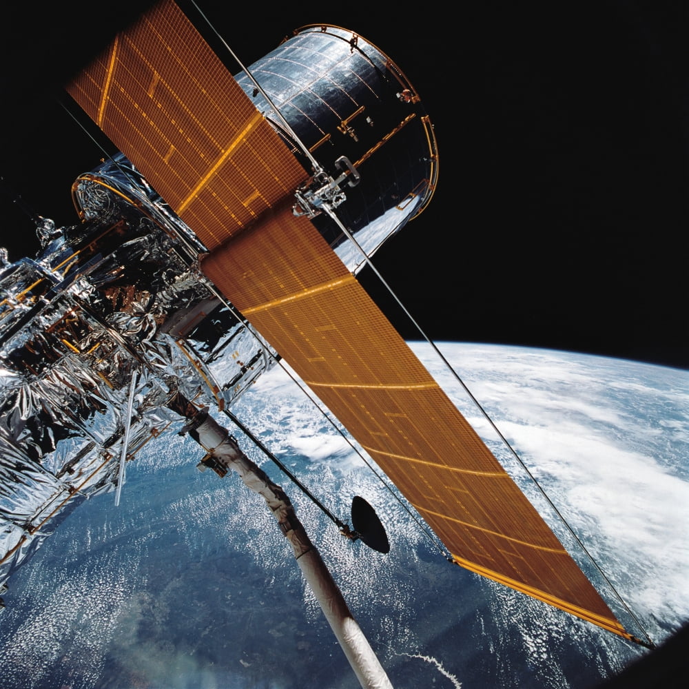 The Hubble Space Telescope backdropped by planet Earth Canvas Art - Stocktrek Images (28 x 28)