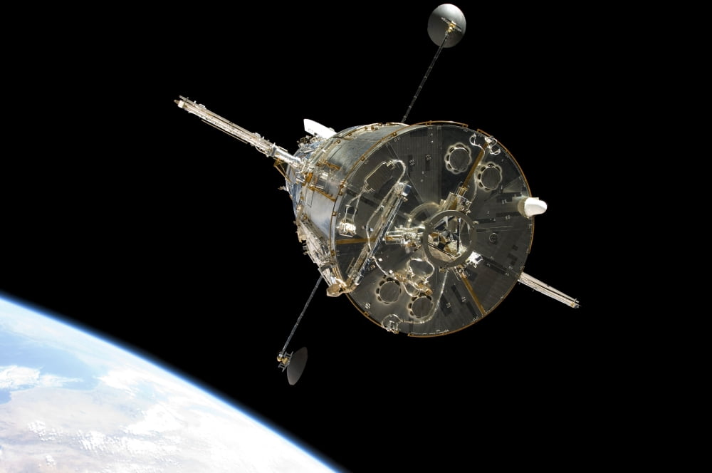 The Hubble Space Telescope in orbit above Earth Canvas Art - Stocktrek Images (34 x 23)