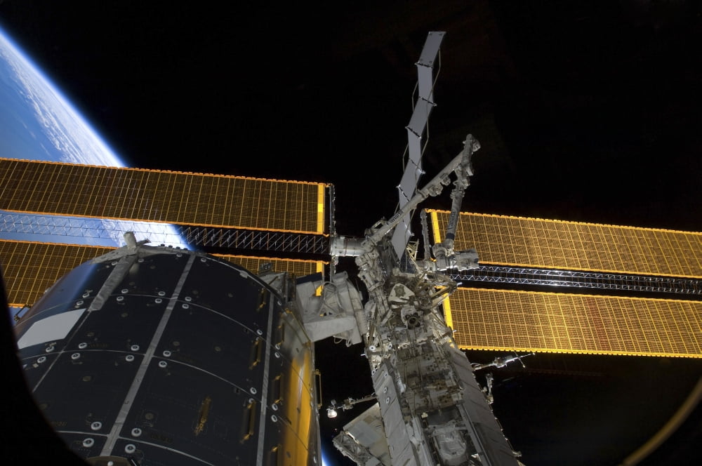The International Space Station and the Columbus laboratory Canvas Art - Stocktrek Images (35 x 23)