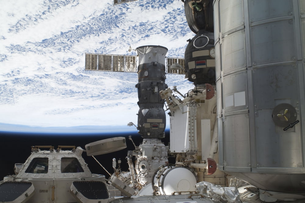 The International Space Station with two docked Russian spacecraft Canvas Art - Stocktrek Images (34 x 23)