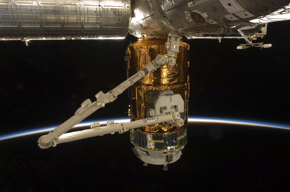 The Japanese H-II Transfer Vehicle docked to the Harmony node Canvas Art - Stocktrek Images (34 x 23)