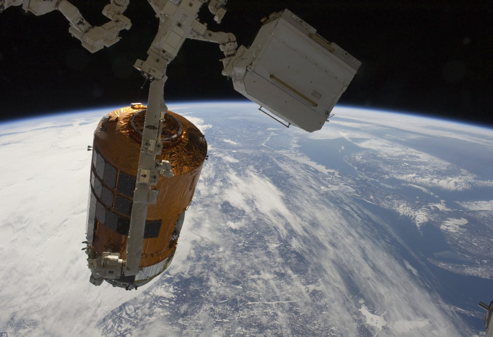 The Japanese Kounotori H-II Transfer Vehicle in the grasp of Canadarm2 Canvas Art - Stocktrek Images (34 x 24)