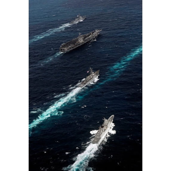 The John C Stennis Carrier Strike Group are underway in formation with naval vessels from the Republic of Korea Poster Print by Stocktrek Images (11 x 17)
