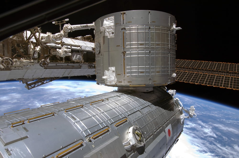 The Kibo Japanese Pressurized Module and Kibo Japanese logistics module of the International Space Station Canvas Art - Stocktrek Images (34 x 23)