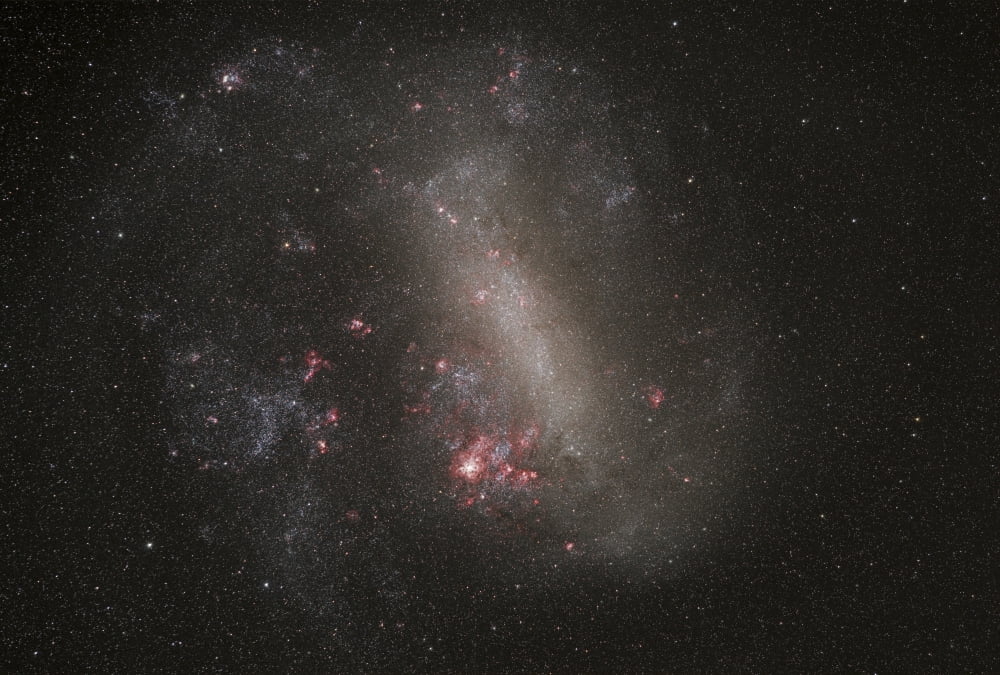 The Large Magellanic Cloud a satellite galaxy of the Milky Way Canvas Art - Philip HartStocktrek Images (34 x 23)
