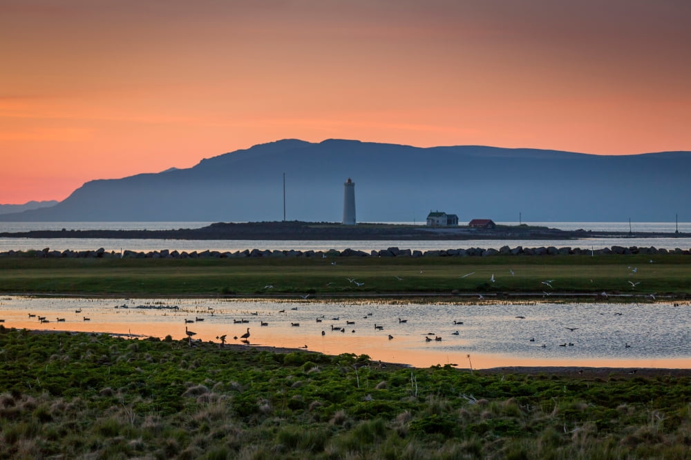 The Lighthouse at Grotta under the Midnight Sun Seltjarnarnes Reykjavik Iceland Canvas Art - Panoramic Images (27 x 9)