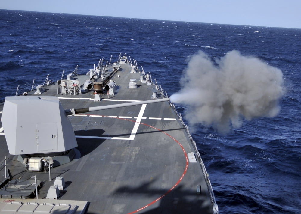 The MK-45 lightweight gun is fired aboard USS Halsey Canvas Art - Stocktrek Images (34 x 24)