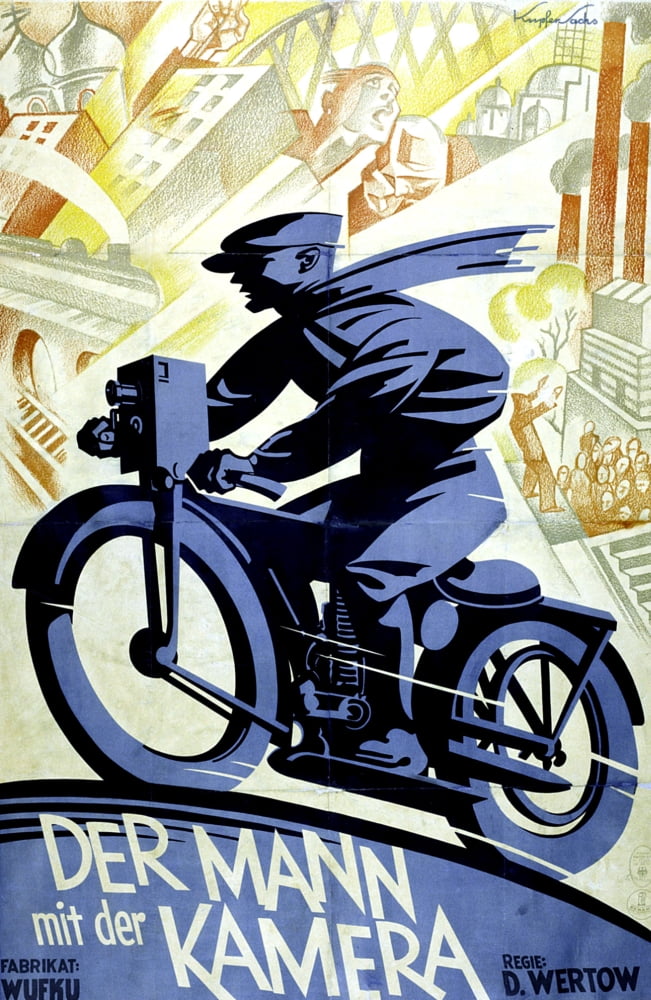 The Man With A Movie Camera Canvas Art - (11 x 17)