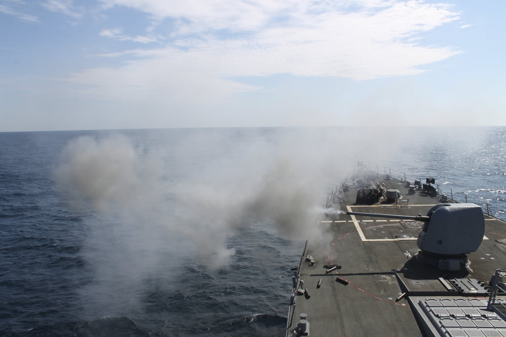 The Mark 45 lightweight gun is fired aboard USS Mahan Canvas Art - Stocktrek Images (34 x 23)