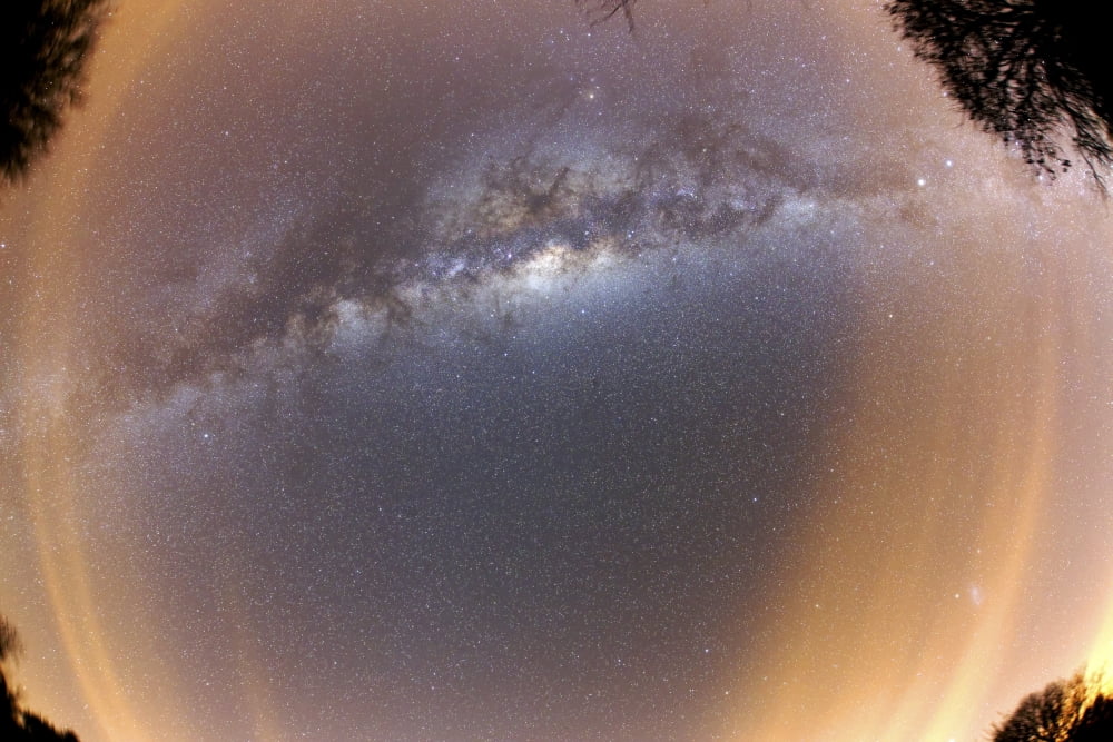 The Milky Way at zenital position with some thin clouds at the horizon Canvas Art - Luis ArgerichStocktrek Images (18 x 12)