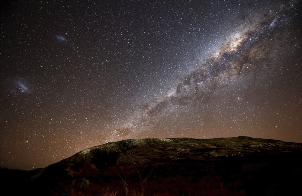 The Milky Way rising above the hills of Azul Argentina Canvas Art - Luis ArgerichStocktrek Images (35 x 23)