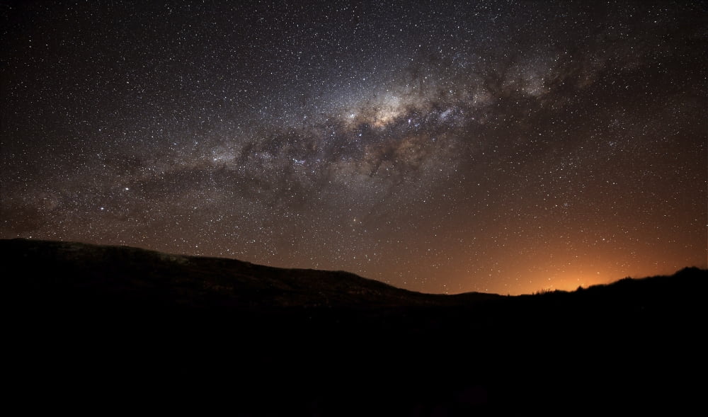 The Milky Way setting behind the hills of Azul Argentina Canvas Art - Luis ArgerichStocktrek Images (37 x 22)