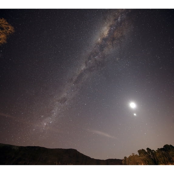 The Milky Way the Moon and Venus over the fields in Azul Argentina Poster Print