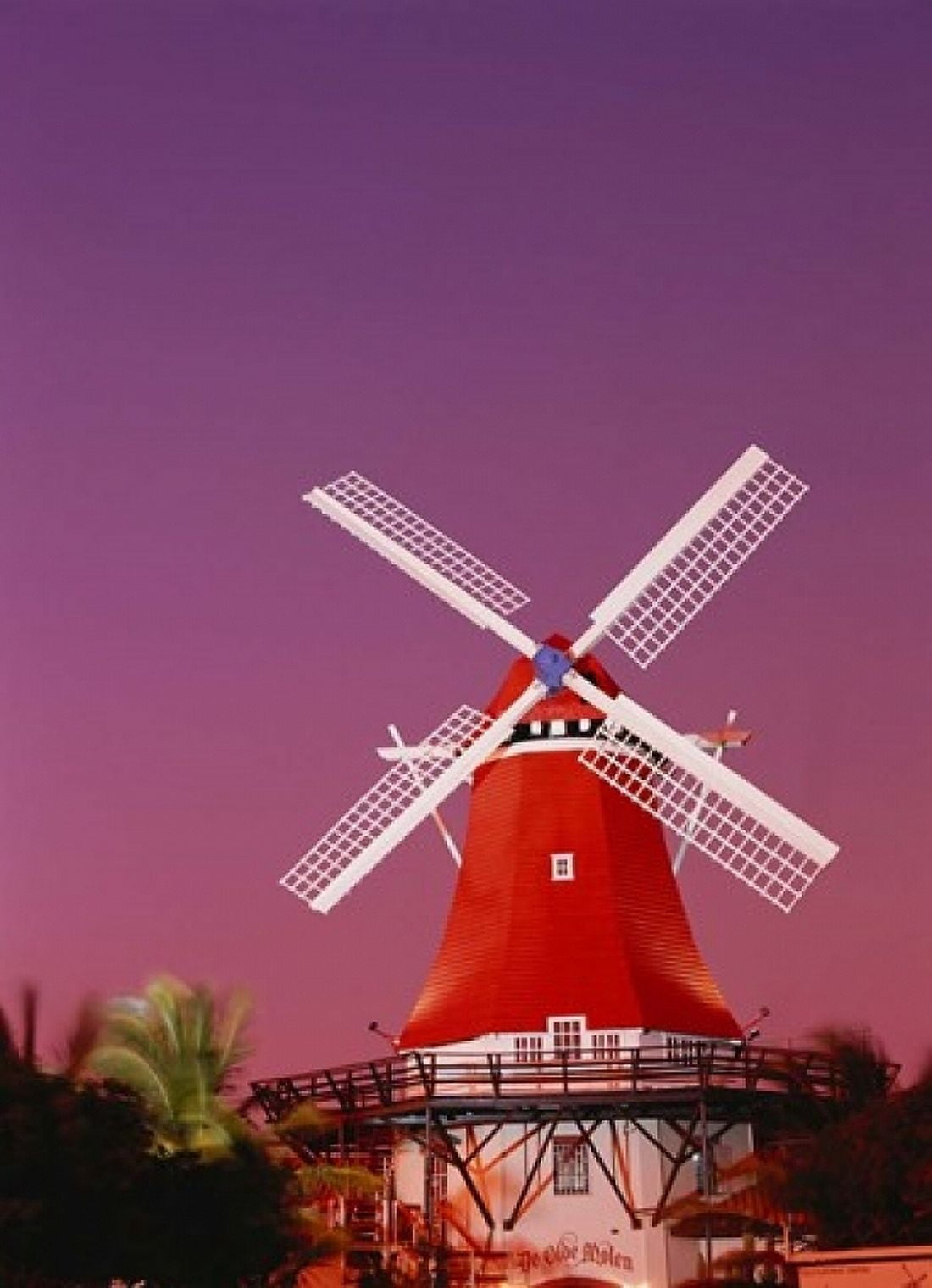 The Mill Resort against pink sky Oranjestad Aruba Canvas Art - Stuart Westmorland DanitaDelimont (11 x 15)