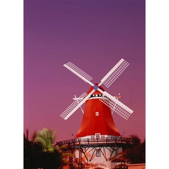 The Mill Resort against pink sky Oranjestad Aruba Canvas Art - Stuart Westmorland DanitaDelimont (22 x 30)