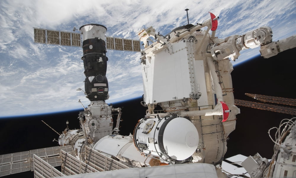 The Mini Research Module 1 attached to the International Space Station Canvas Art - Stocktrek Images (37 x 22)