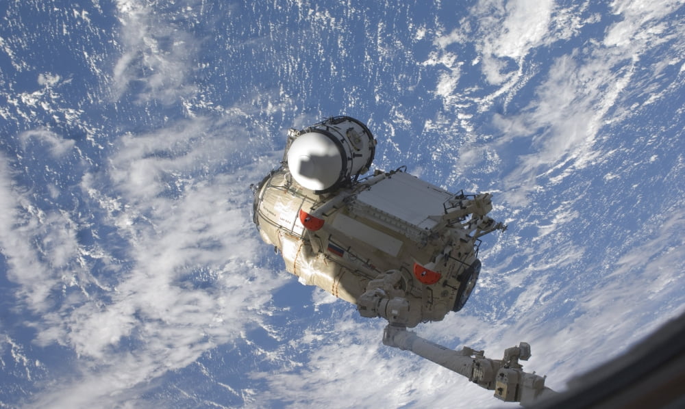 The Mini Research Module 1 segment of the International Space Station Canvas Art - Stocktrek Images (36 x 22)