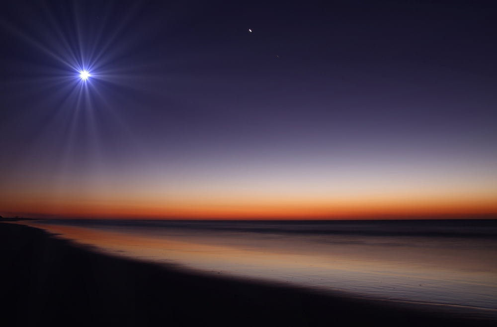 The Moon and Venus at twilight from the beach of Pinamar Argentina Canvas Art - Luis ArgerichStocktrek Images (18 x 12)