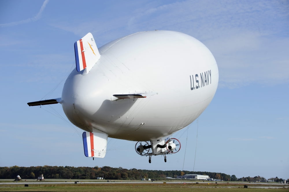The Navys MZ-3A manned airship lifts off for an orientation flight Canvas Art - Stocktrek Images (34 x 23)
