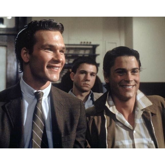 The Outsiders Patrick Swayze Rob Lowe smiling pose C.Thomas Howell 8x10 photo