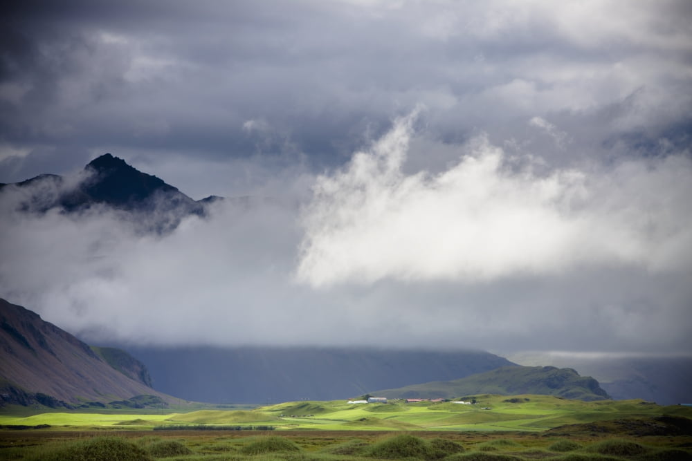 The Peak Of A Mountain Seen Through Low Lying Clouds Iceland Canvas Art - David DuChemin Design Pics (38 x 24)