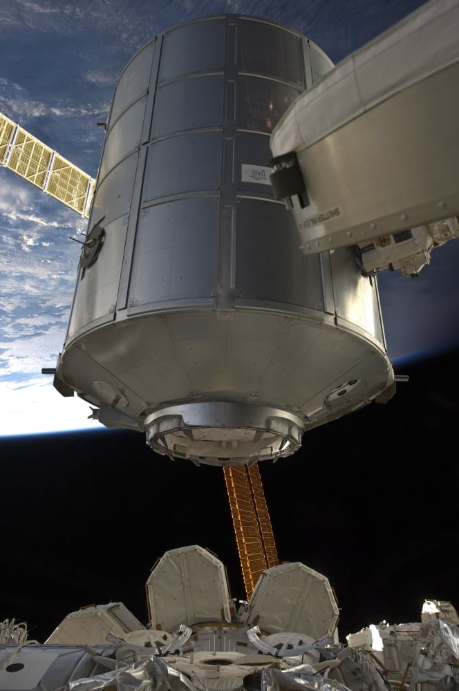 The Permanent Multipurpose Module in the grasp of Canadarm2 Canvas Art - Stocktrek Images (23 x 35)
