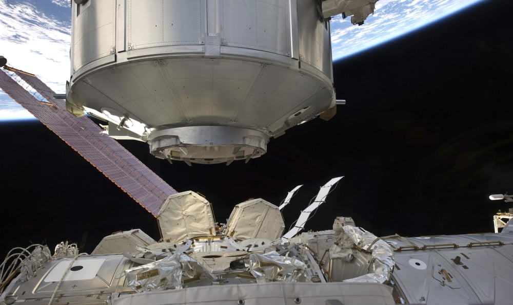 The Permanent Multipurpose Module in the grasp of Canadarm2 Canvas Art - Stocktrek Images (37 x 22)