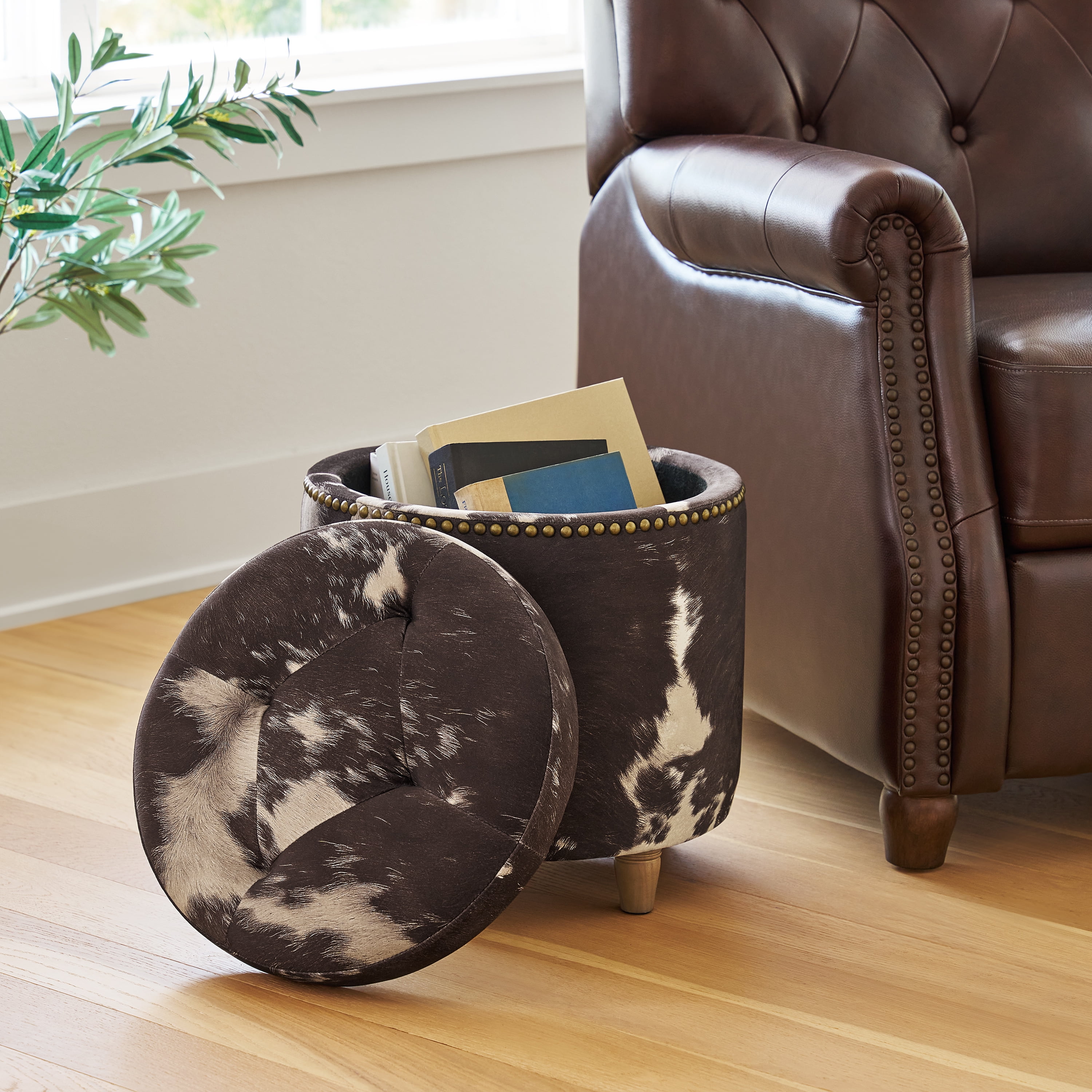 Round cowhide ottoman discount