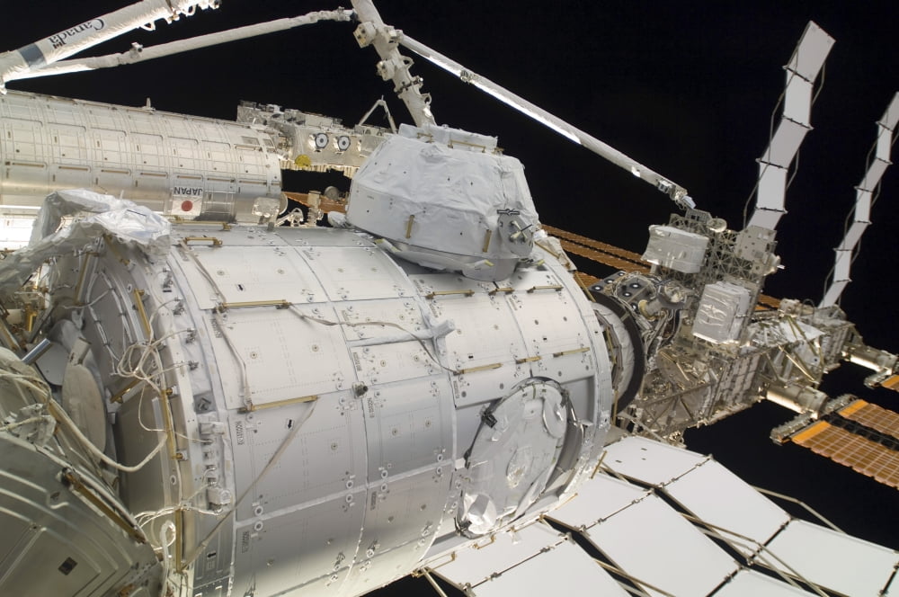 The Pressurized Mating Adapter 3 in the grasp of the Canadarm2 Canvas Art - Stocktrek Images (34 x 23)