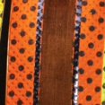 thumbnail image 1 of The Ribbon People Orange and Black Polka Dots Wired Craft Ribbon 1.5" x 40 Yards, 1 of 2