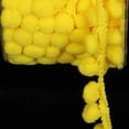 thumbnail image 1 of The Ribbon People Yellow Crane Pom-Poms Woven Craft Trim .875" x 44 Yards, 1 of 2