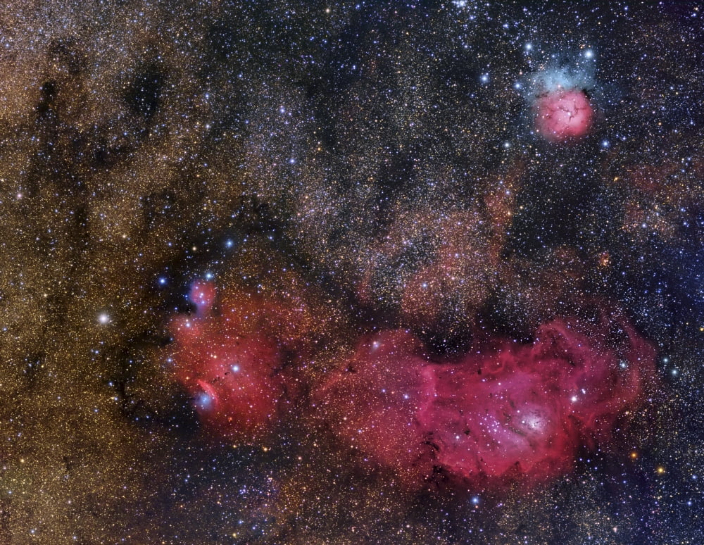 The Sagittarius Triplet featuring the Lagoon and Trifid Nebula and NGC 6559 Canvas Art - Roberto ColombariStocktrek Images (32 x 25)